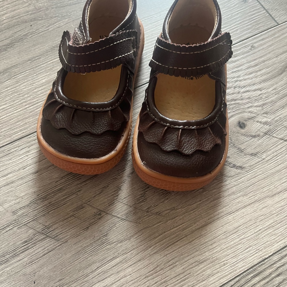 Little girl shoes like new only wore a couple of times.